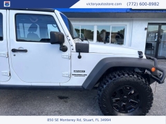 Used 2014 Jeep Wrangler Unlimited 4WD 4dr Sport at Victory Auto Store near Stuart, FL