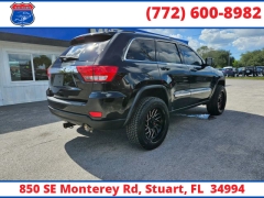 Used 2011  Jeep Grand Cherokee 4WD 4dr Laredo at Victory Auto Store near Stuart, FL