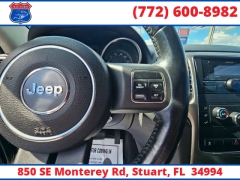 Used 2011  Jeep Grand Cherokee 4WD 4dr Laredo at Victory Auto Store near Stuart, FL