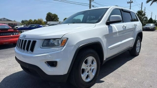 Used 2015 Jeep Grand Cherokee 4WD 4dr Laredo at Victory Auto Store near Stuart, FL