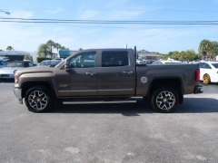 Used 2015 GMC Sierra 1500 4WD Crew Cab SLT at Victory Auto Store near Stuart, FL