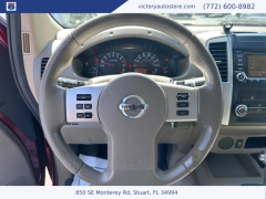 Used 2015 Nissan Frontier 2WD Crew Cab SWB at Victory Auto Store near Stuart, FL
