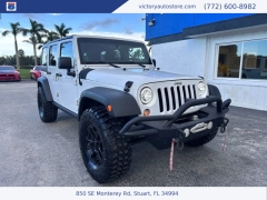 Used 2014 Jeep Wrangler Unlimited 4WD 4dr Sport at Victory Auto Store near Stuart, FL