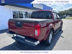 Used 2015 Nissan Frontier 2WD Crew Cab SWB at Victory Auto Store near Stuart, FL