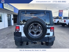 Used 2014 Jeep Wrangler Unlimited 4WD 4dr Sport at Victory Auto Store near Stuart, FL