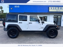 Used 2014 Jeep Wrangler Unlimited 4WD 4dr Sport at Victory Auto Store near Stuart, FL
