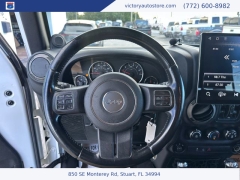 Used 2014 Jeep Wrangler Unlimited 4WD 4dr Sport at Victory Auto Store near Stuart, FL
