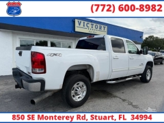 Used 2009  GMC Sierra 2500HD 4WD Crew Cab 153" SLT at Victory Auto Store near Stuart&comma; FL