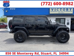 Used 2014  Jeep Wrangler Unlimited 4WD 4dr Sahara at Victory Auto Store near Stuart&comma; FL