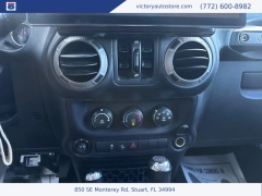 Used 2014 Jeep Wrangler Unlimited 4WD 4dr Sport at Victory Auto Store near Stuart, FL