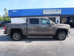 Used 2015 GMC Sierra 1500 4WD Crew Cab SLT at Victory Auto Store near Stuart, FL