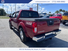 Used 2015 Nissan Frontier 2WD Crew Cab SWB at Victory Auto Store near Stuart, FL