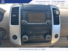 Used 2015 Nissan Frontier 2WD Crew Cab SWB at Victory Auto Store near Stuart, FL