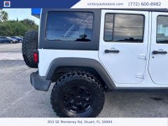 Used 2014 Jeep Wrangler Unlimited 4WD 4dr Sport at Victory Auto Store near Stuart, FL