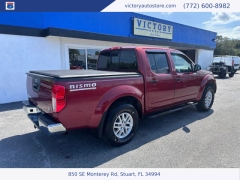 Used 2015 Nissan Frontier 2WD Crew Cab SWB at Victory Auto Store near Stuart, FL