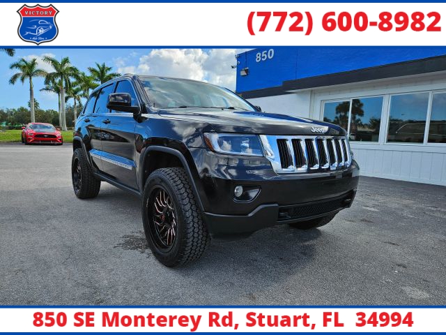 Used 2011  Jeep Grand Cherokee 4WD 4dr Laredo at Victory Auto Store near Stuart, FL
