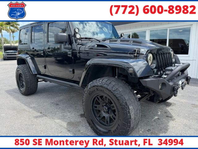 Used 2014  Jeep Wrangler Unlimited 4WD 4dr Sahara at Victory Auto Store near Stuart&comma; FL