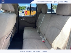 Used 2015 Nissan Frontier 2WD Crew Cab SWB at Victory Auto Store near Stuart, FL