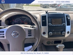 Used 2015 Nissan Frontier 2WD Crew Cab SWB at Victory Auto Store near Stuart, FL