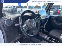 Used 2014 Jeep Wrangler Unlimited 4WD 4dr Sport at Victory Auto Store near Stuart, FL