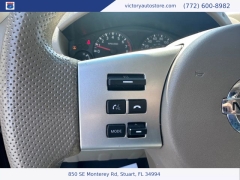 Used 2015 Nissan Frontier 2WD Crew Cab SWB at Victory Auto Store near Stuart, FL