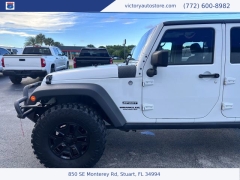 Used 2014 Jeep Wrangler Unlimited 4WD 4dr Sport at Victory Auto Store near Stuart, FL