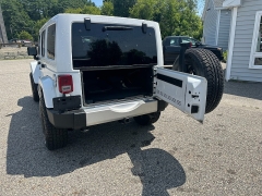 Used 2015 Jeep Wrangler Unlimited 4d Convertible Sahara at Headlight Motor Group near Lewiston, ME
