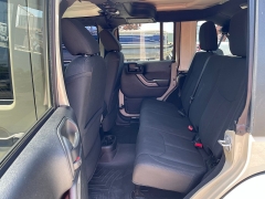 Used 2018 Jeep Wrangler JK Unlimited 4d SUV 4WD Sport at The Car Coach near Frankfort, KY