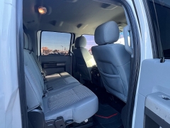 Used 2014  Ford Super Duty F-350 SRW 4WD Crew Cab 156" Lariat at J & J Autoplex near Garden City, KS