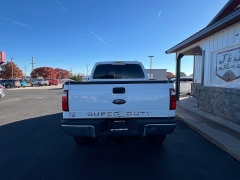Used 2014  Ford Super Duty F-350 SRW 4WD Crew Cab 156" Lariat at J & J Autoplex near Garden City, KS