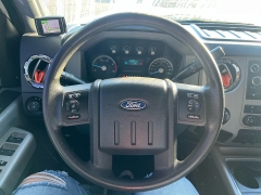 Used 2014  Ford Super Duty F-350 SRW 4WD Crew Cab 156" Lariat at J & J Autoplex near Garden City, KS