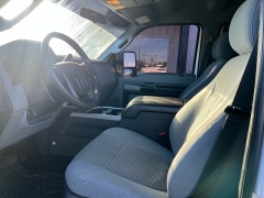 Used 2014  Ford Super Duty F-350 SRW 4WD Crew Cab 156" Lariat at J & J Autoplex near Garden City, KS