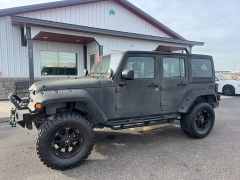 Used 2013 Jeep Wrangler Unlimited 4WD 4dr Sport at J & J Autoplex near Garden City, KS