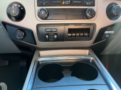 Used 2014  Ford Super Duty F-350 SRW 4WD Crew Cab 156" Lariat at J & J Autoplex near Garden City, KS