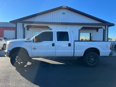 Used 2014  Ford Super Duty F-350 SRW 4WD Crew Cab 156" Lariat at J & J Autoplex near Garden City, KS