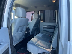 Used 2014  Ford Super Duty F-350 SRW 4WD Crew Cab 156" Lariat at J & J Autoplex near Garden City, KS