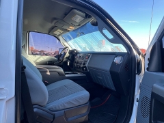 Used 2014  Ford Super Duty F-350 SRW 4WD Crew Cab 156" Lariat at J & J Autoplex near Garden City, KS