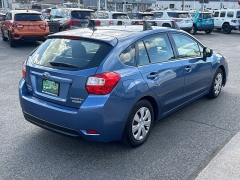 Used 2014  Subaru Impreza 4d Hatchback i CVT at Bulldog Motors near Pasco&comma; WA