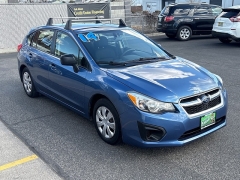 Used 2014  Subaru Impreza 4d Hatchback i CVT at Bulldog Motors near Pasco&comma; WA