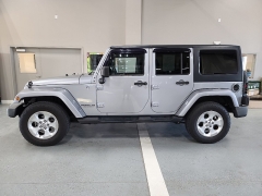 Used 2014  Jeep Wrangler Unlimited 4WD 4dr Sahara at J's Auto near Manchester, IA