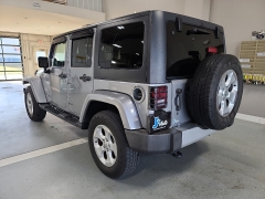 Used 2014  Jeep Wrangler Unlimited 4WD 4dr Sahara at J's Auto near Manchester, IA