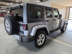 Used 2014  Jeep Wrangler Unlimited 4WD 4dr Sahara at J's Auto near Manchester, IA
