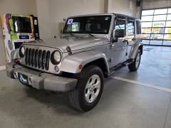 Used 2014  Jeep Wrangler Unlimited 4WD 4dr Sahara at J's Auto near Manchester, IA