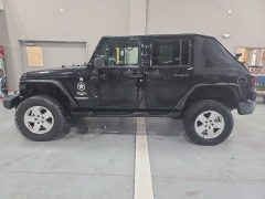  2009 Jeep Wrangler Unlimited 4d Convertible 4WD Sahara at J's Auto near Manchester&comma; IA