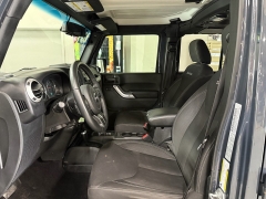 Used 2017  Jeep Wrangler Unlimited Sahara 4x4 at J's Auto near Manchester&comma; IA