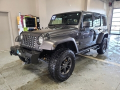 Used 2014  Jeep Wrangler Unlimited 4WD 4dr Sahara at J's Auto near Manchester&comma; IA