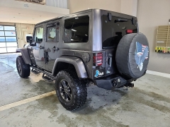 Used 2014  Jeep Wrangler Unlimited 4WD 4dr Sahara at J's Auto near Manchester&comma; IA