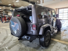 Used 2014  Jeep Wrangler Unlimited 4WD 4dr Sahara at J's Auto near Manchester&comma; IA