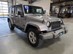 Used 2014  Jeep Wrangler Unlimited 4WD 4dr Sahara at J's Auto near Manchester, IA