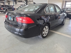 Used 2009  Kia Optima 4d Sedan EX at J's Auto near Manchester, IA